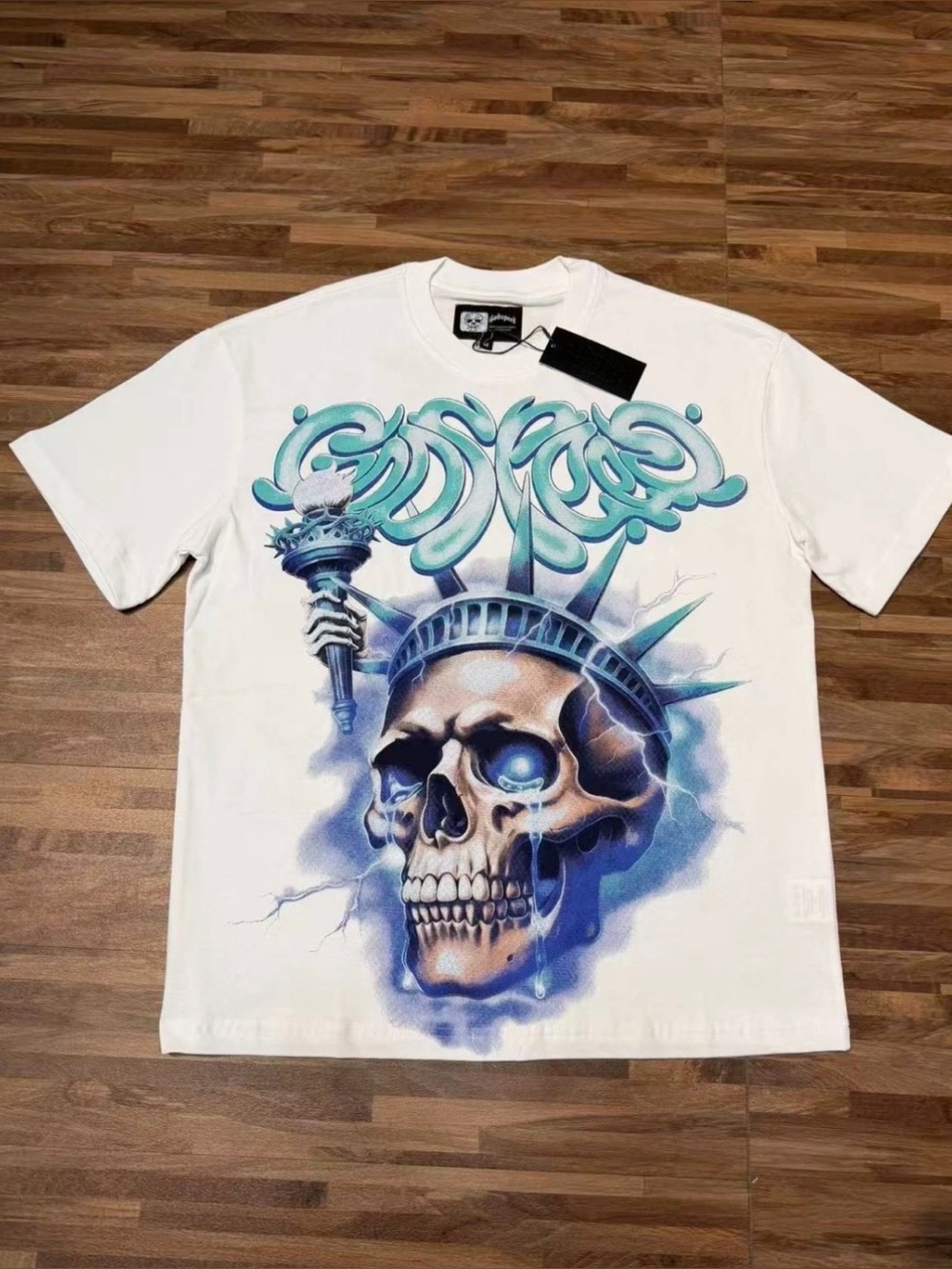 Men's White Short-Sleeve Tee with Blue Skull Statue Graphic